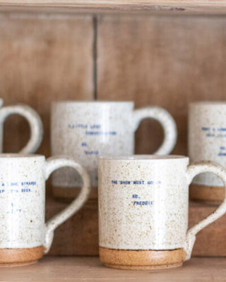 a group of mugs with handles