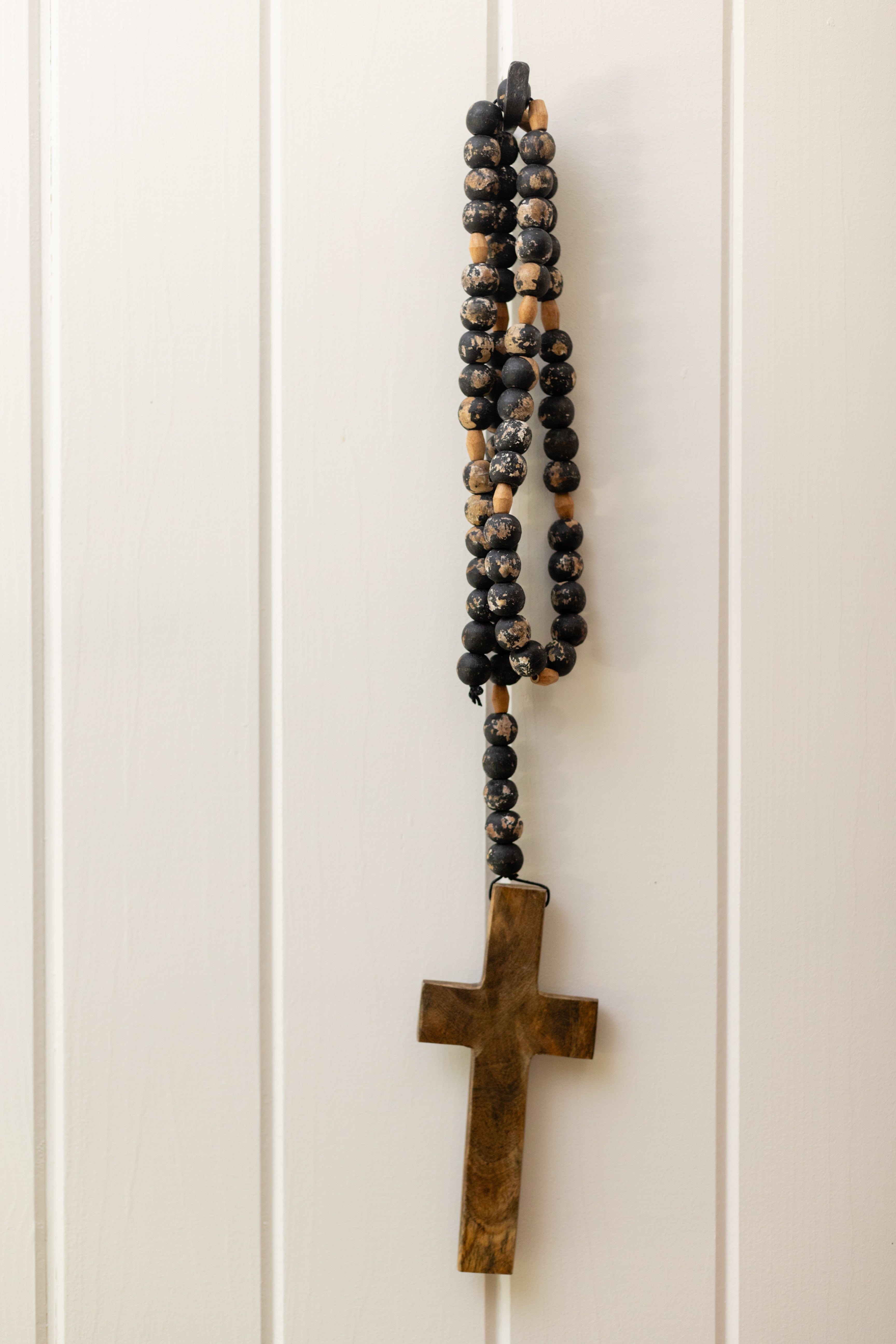 ***Cross on Antiqued Black Wood Bead Strand