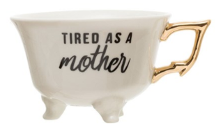White Stoneware Footed Teacup "Tired as a Mother"
