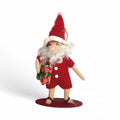 Surfing Santa Holding Floral Present Ornament