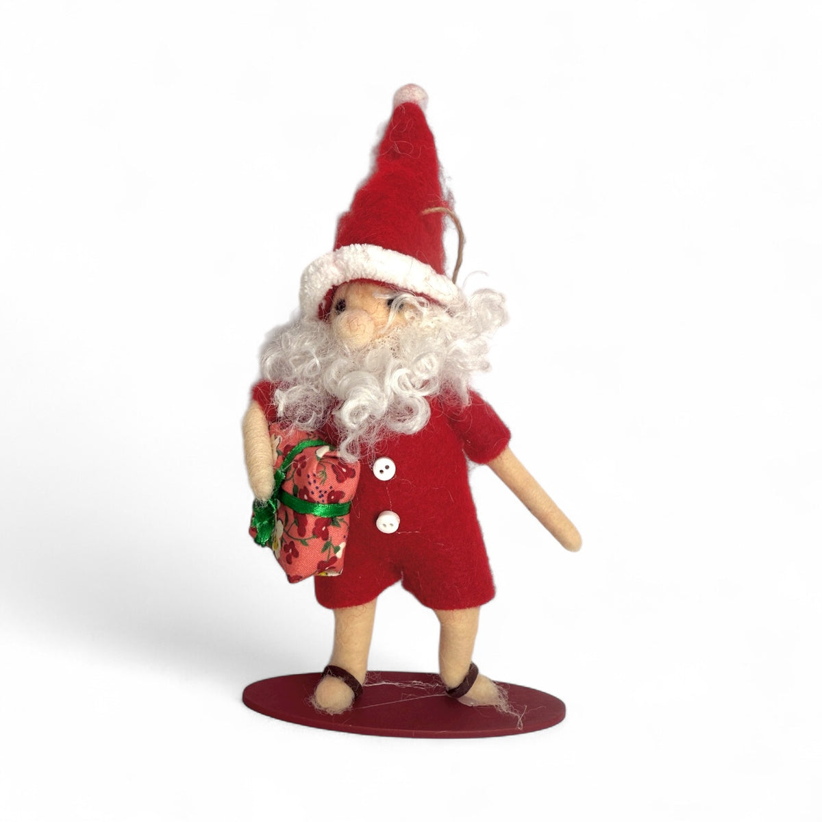 Surfing Santa Holding Floral Present Ornament