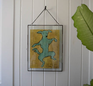  Dancing Dog Art Poster hanging on a wall 