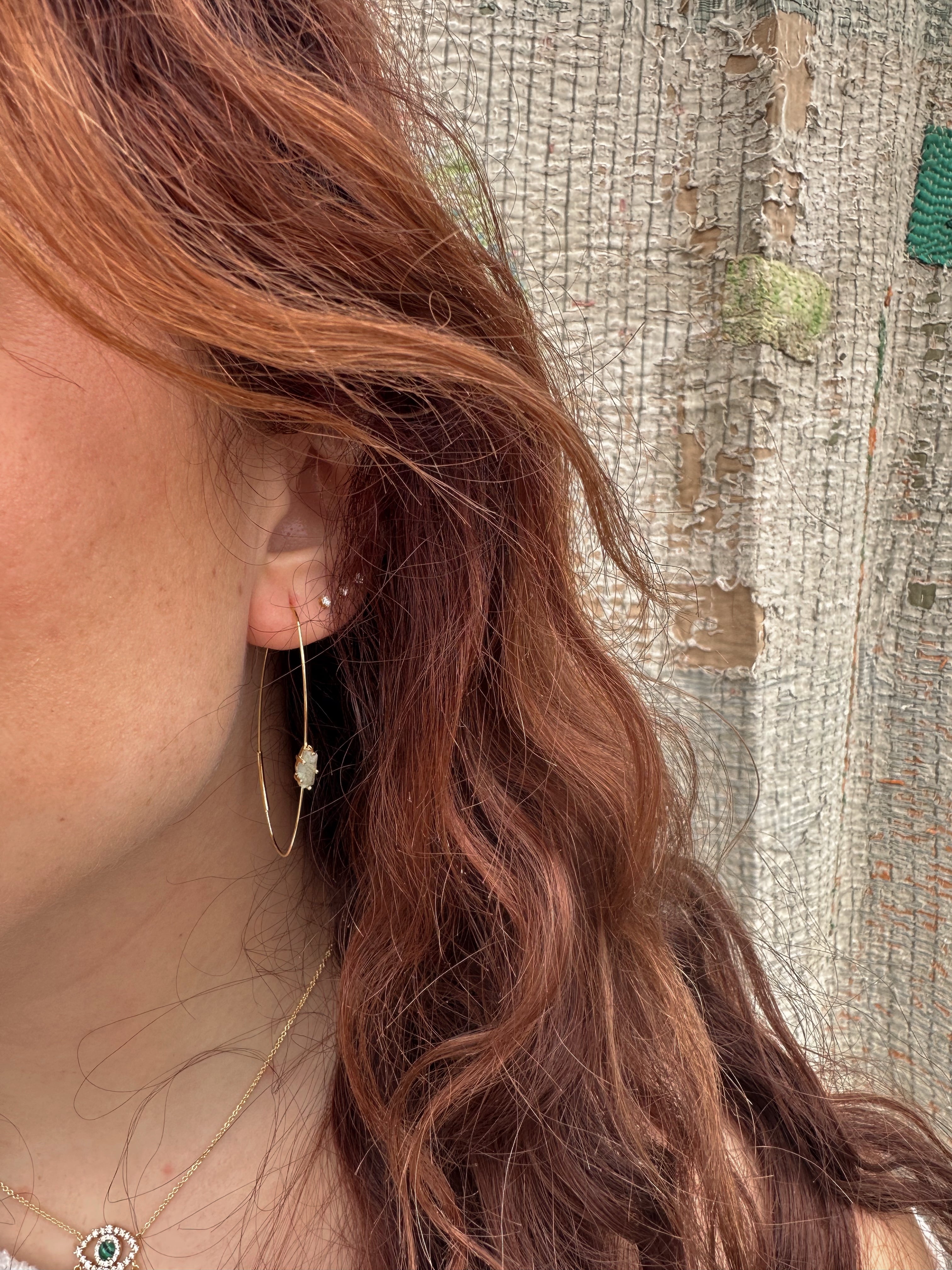 Elongated Hoop With Single Stone