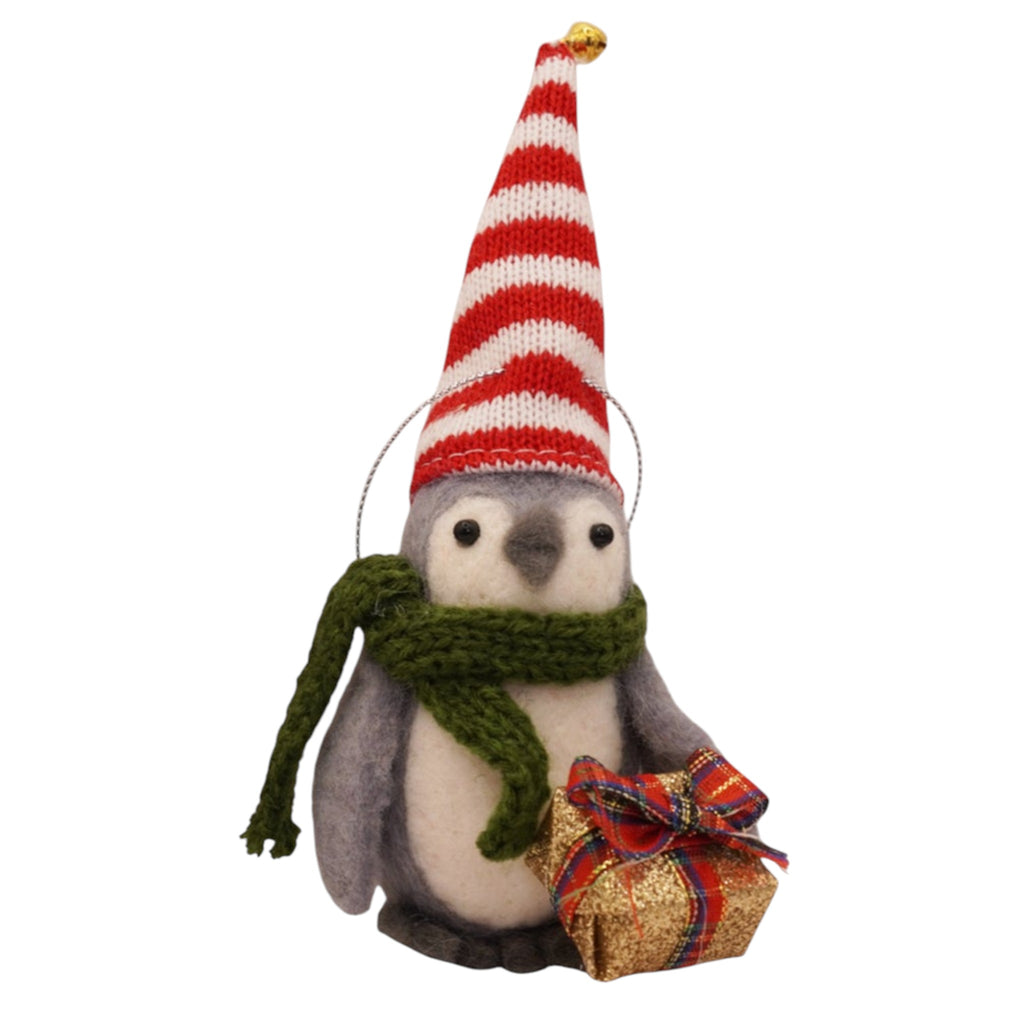 Boy penguin with red and white long cap - Huddle of Penguins