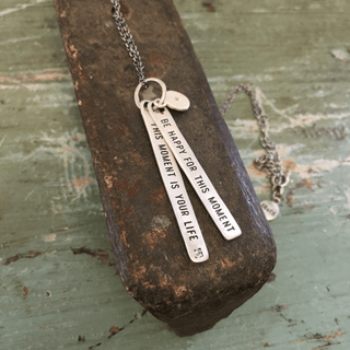 sterling silver necklace with the quote "be happy for this moment. this moment is your life"