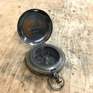 open compass with the phrase "seek and you shall find"
