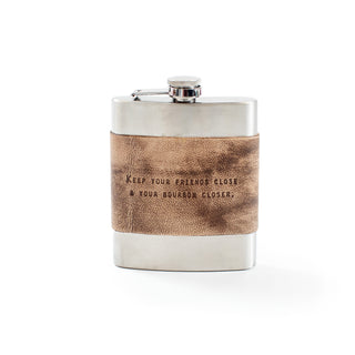 flask with the quote "keep your friends close & your bourbon closer."