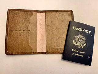 inside of leather passport to show slots for passport cover