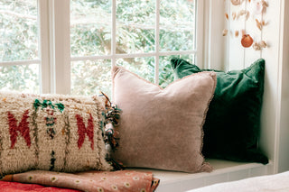 velvet pillows with pom pom trim