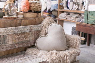 heart shaped pillow with frayed edges